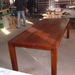 Pine beam dining tables in the workshop.